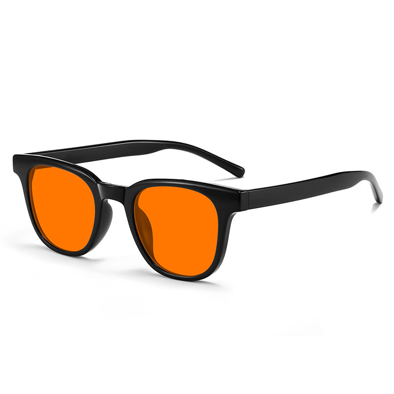 Red-Lens Evening Glasses, Black · Bold frame, Orange lens